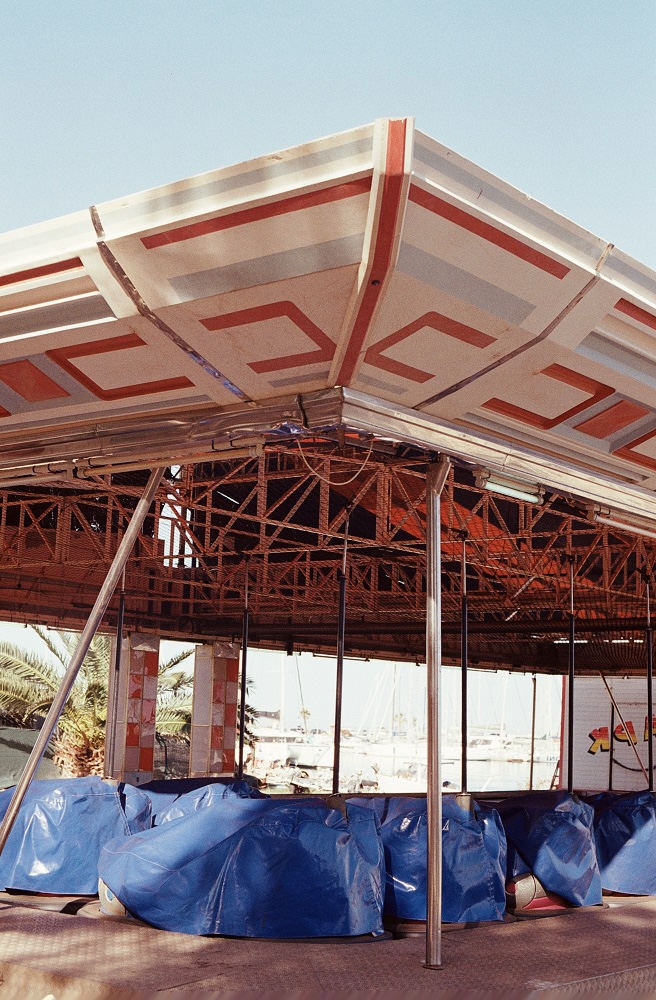 analog photograph of a closed fun fair in Greece